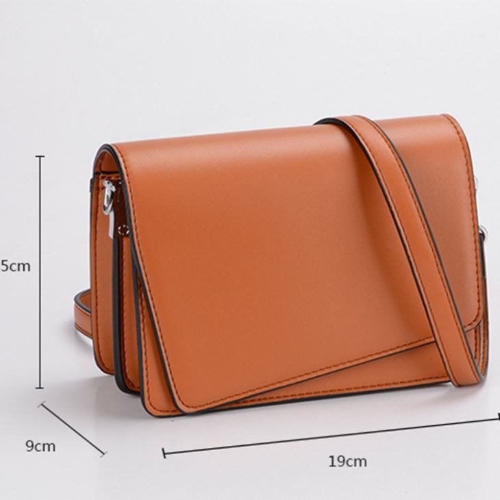 flap closure crossbody bag 2023